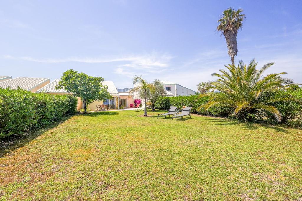 Palmeria - Maison climatisée accès direct plage